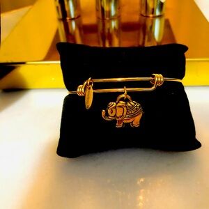 I call him “Lucky” Brass Bangle and Charms.